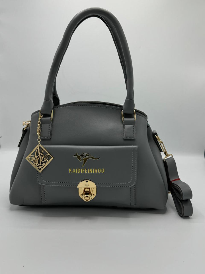 Elegant emobossed handbag with front pocket